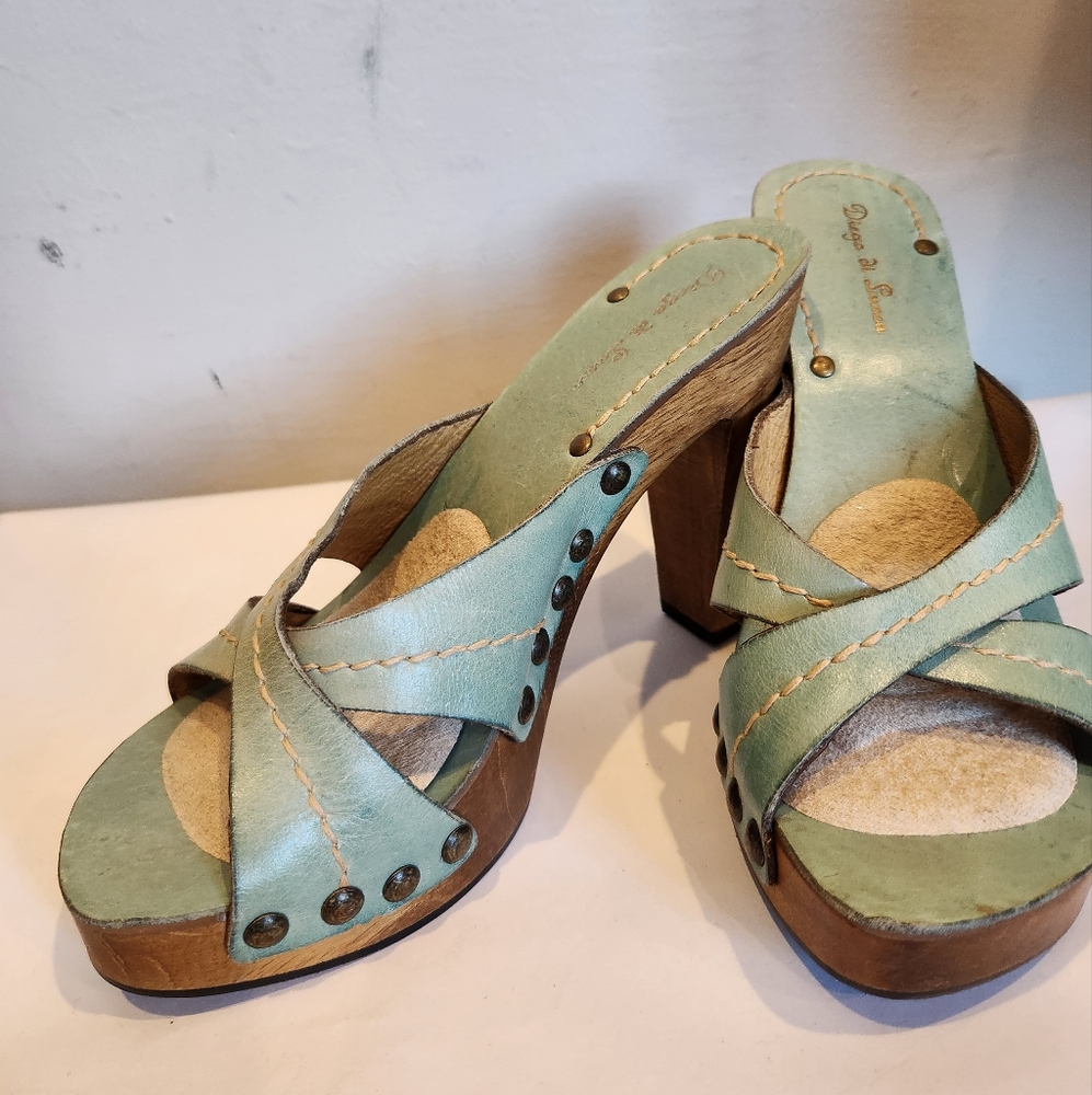 Green Mules with Circular Cutouts and Artisanal Design